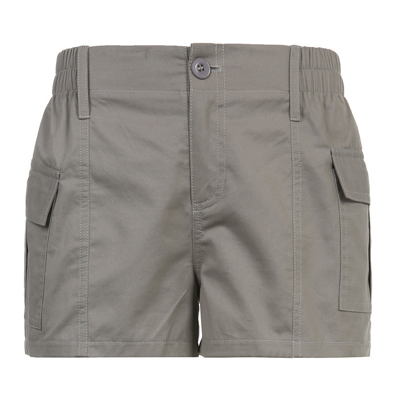 Pantalones cargo de ocio con cintura elástica, botones, bolsillos asimétricos, pantalones cortos de cintura baja de color liso